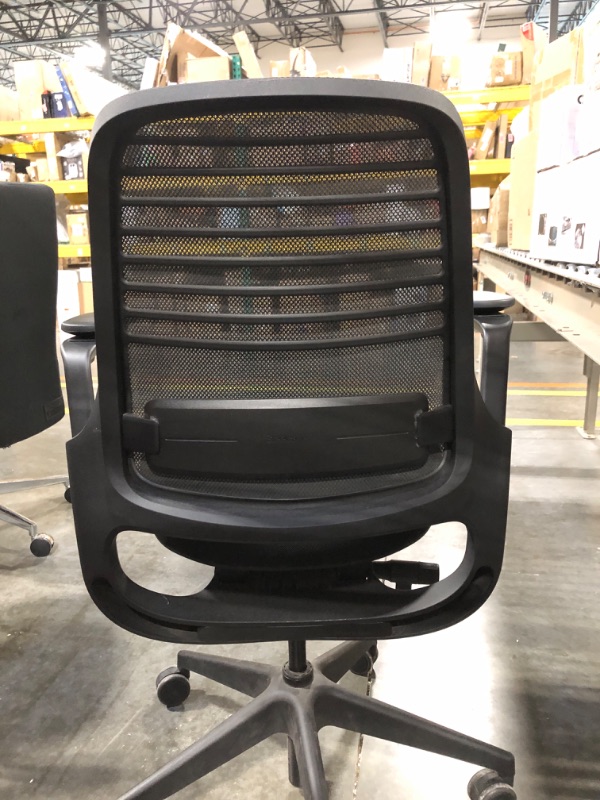 Photo 4 of ***CHAIR DOESNT MOVE UP AND DOWN***  

Steelcase Series 1 Office Chair - Ergonomic Work Chair with Wheels for Carpet - Helps Support Productivity - Weight-Activated Controls, Back Supports & Arm Support - Easy Assembly - Graphite
***Used, but in good cond