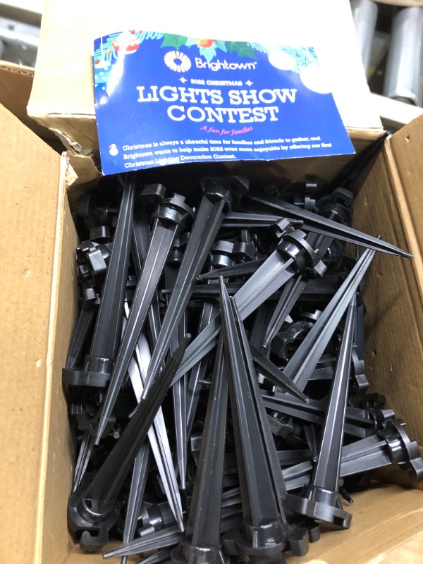 Photo 3 of 200-Pack Plastic Light Stakes, 4.5 Inch Christmas Yard Stakes for C7 C9 Christmas Lights Outdoor, Universal Light Stakes for Outdoor Holiday Lights Use on Garden Lawn Patio Path Walkway – Black 200 Pack