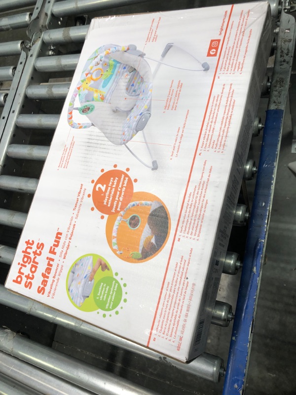 Photo 1 of Bright Starts Safari Fun 3-Point Harness Vibrating Baby Bouncer with Toy bar