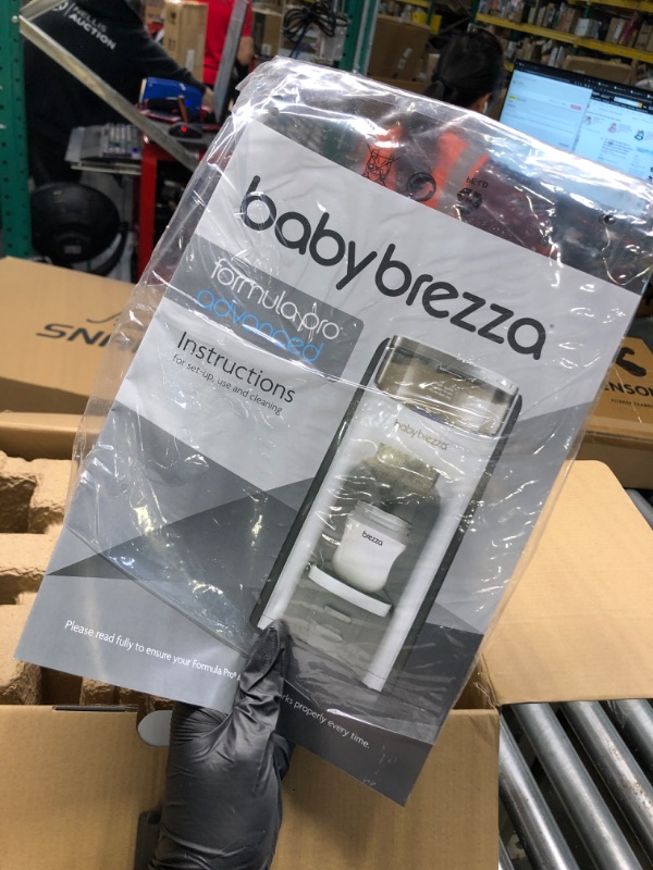 Photo 3 of **USED** New and Improved Baby Brezza Formula Pro Advanced Formula Dispenser Machine - Automatically Mix a Warm Formula Bottle Instantly - Easily Make Bottle with Automatic Powder Blending