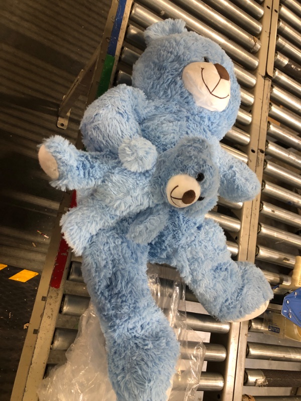 Photo 1 of Big blue teddy bear holding smaller bear 