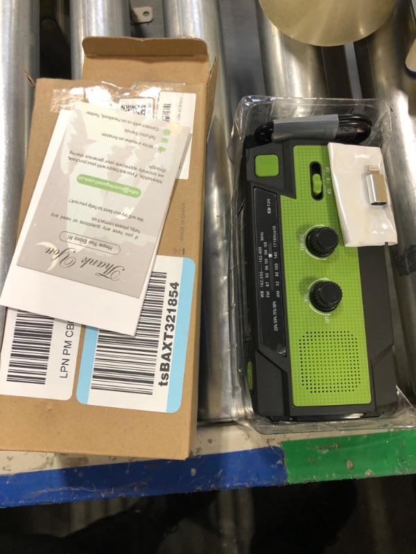 Photo 2 of ?2021 Newest?RunningSnail Emergency Crank Radio?4000mAh-Solar Hand Crank Portable AM/FM/NOAA Weather Radio with 1W Flashlight and Motion Sensor Reading Lamp?Cell Phone Charger