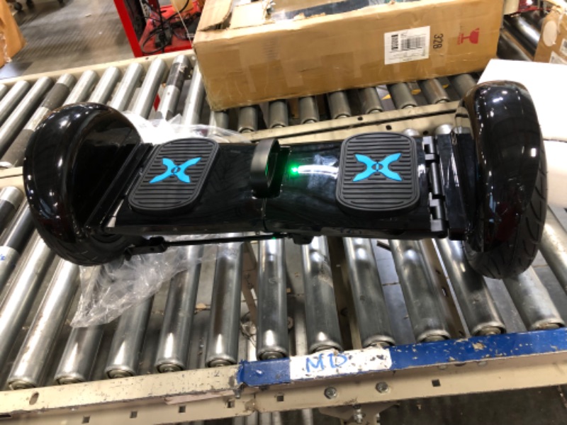Photo 1 of Hover-1 Rogue Electric Folding Hoverboard | 9MPH Top Speed, 7 Mile Range, 5HR Full-Charge, Built-in Bluetooth Speaker, Rider Modes: Beginner to Expert Black