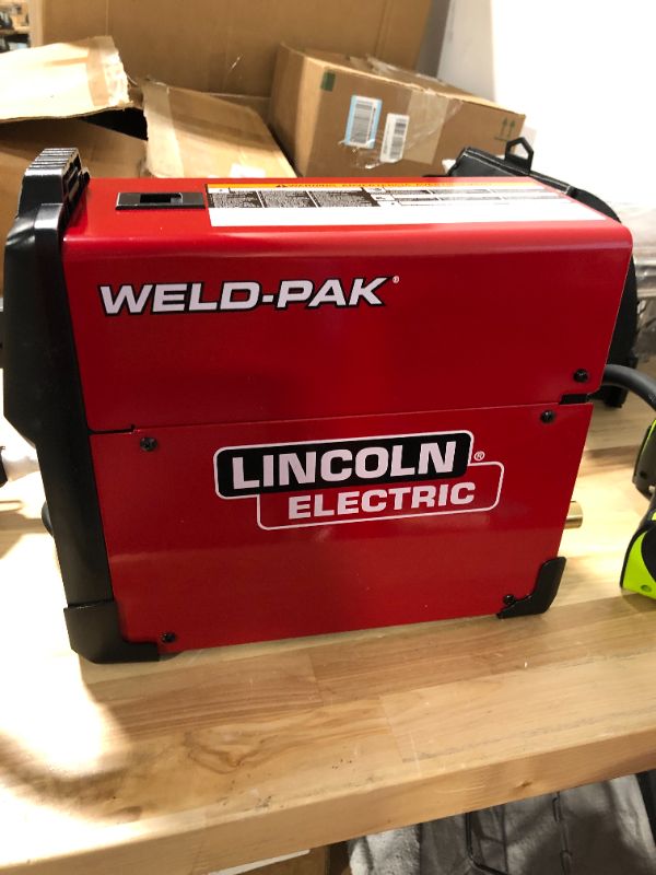 Photo 6 of Lincoln Electric 90i MIG and Flux Core Wire Feed Weld-PAK Welder, 120V Welding Machine, Portable w/Shoulder Strap, Protective Metal Case, Best for Small Jobs, K5256-1 MIG and Flux-Cored Welder