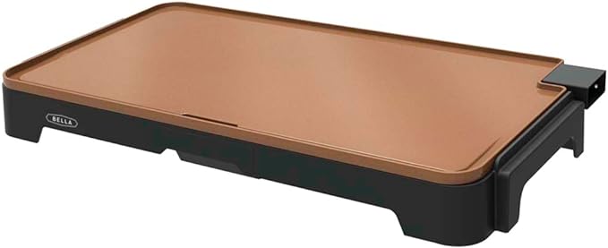 Photo 1 of ******FOR PARTS**** 
BELLA XL Electric Ceramic Titanium Griddle, Make 15 Eggs At Once, Healthy-Eco Non-stick Coating, Hassle-Free Clean Up, Large Submersible Cooking Surface, 12" x 22", Copper/Black