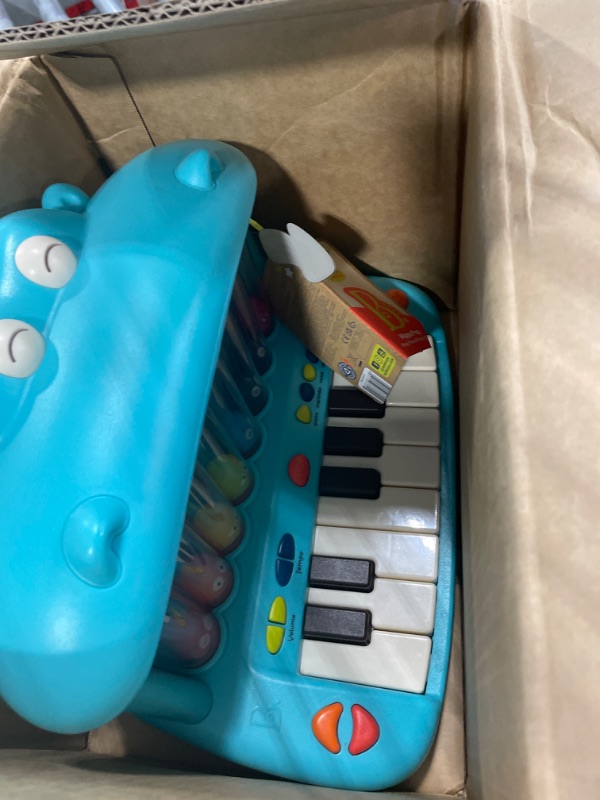 Photo 2 of B. toys- Hippo Pop- Musical Toy Keyboard – Play Piano – Songs, Sounds & Lights – Musical Instrument for Toddlers, Kids – 12 Months +