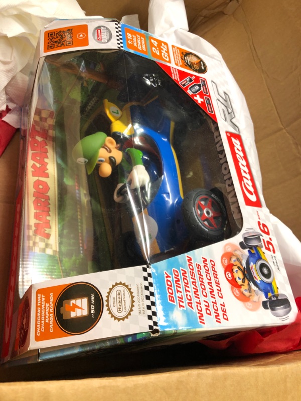 Photo 3 of Carrera RC Official Licensed Mario Kart Mach 8 Luigi 1: 18 Scale 2.4 Ghz Remote Radio Control Car with Rechargeable Lifepo4 Battery - Kids Toys Boys/Girls, (Model: 181067) Mario Kart Mach 8 - Luigi