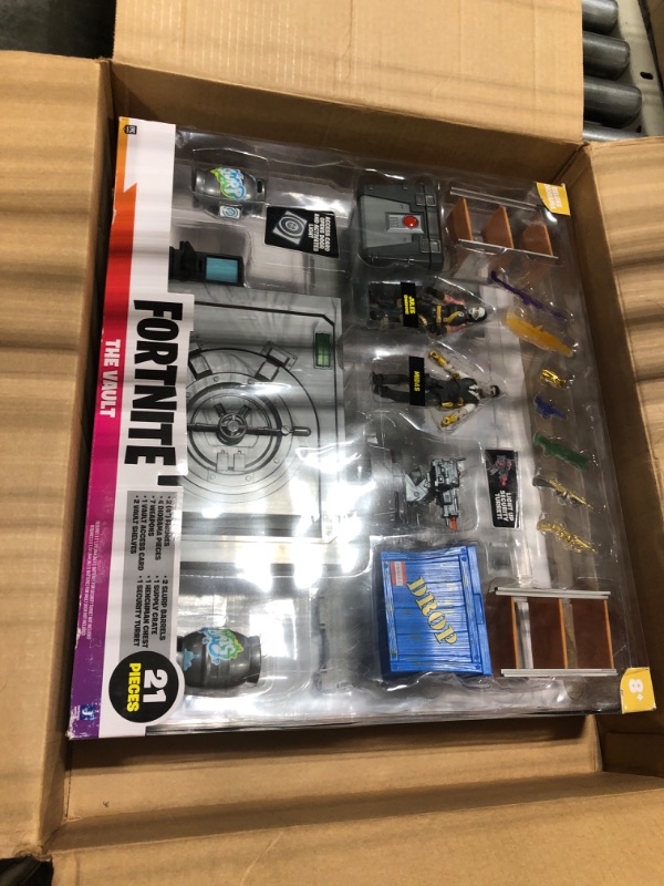 Photo 2 of Fortnite The Vault Deluxe Diorama, Includes 2 (4-inch) Articulated Figures, Playset with Breakaway Wall, Weapons, and 21 Accessories.+