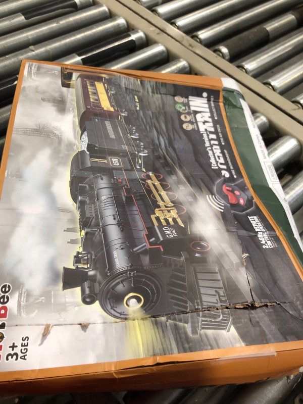 Photo 2 of Hot Bee Train Set for Boys,Remote Control Christmas Train Sets w/Steam Locomotive,Light Passenger Cars & Tracks,Trains Toys w/Smoke,Whistle & Lights,Christmas Toys Gifts for 3 4 5 6 7 8+ Year Old Kids Remote Control Train