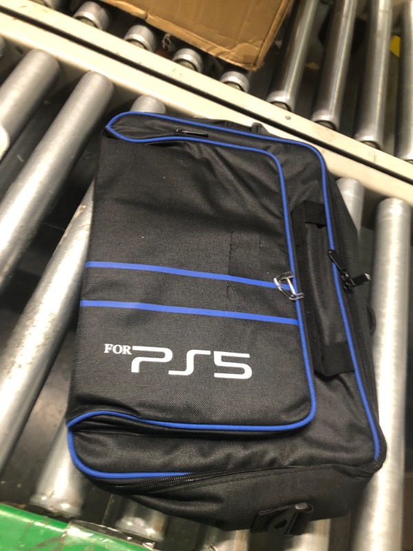 Photo 4 of PlayStation®5 Digital Edition (slim)
with ps5 blue and black bag 