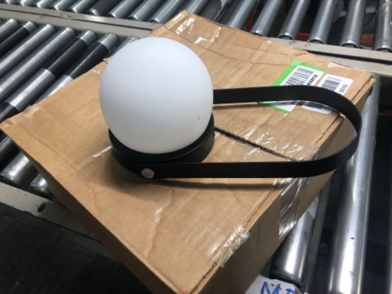 Photo 1 of Menu Carrie Portable LED Lamp. Perfect Warm Light for Indoors or Outdoors. Dimmable and Rechargeable, Great Gift (Black)
