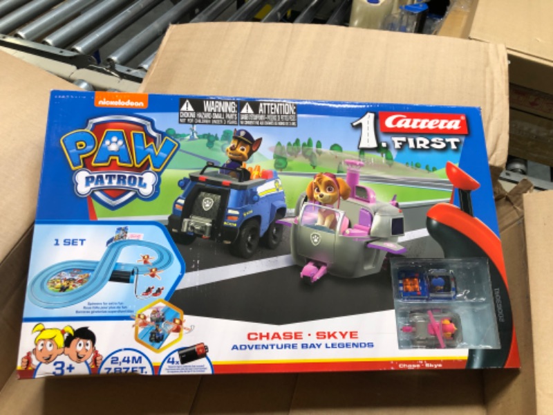 Photo 3 of Carrera First Paw Patrol - Slot Car Race Track - Includes 2 Cars: Chase and Skye - Battery-Powered Beginner Racing Set for Kids Ages 3 Years and Up, Paw Patrol - Adventure Bay