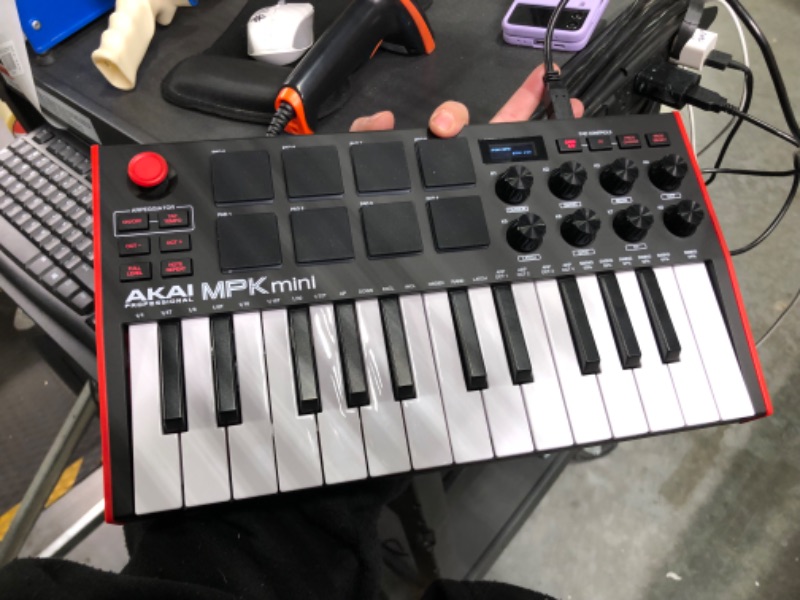 Photo 3 of AKAI Professional MPK Mini MK3 - 25 Key USB MIDI Keyboard Controller With 8 Backlit Drum Pads, 8 Knobs and Music Production Software Included MPK Mini MPK Mini Only