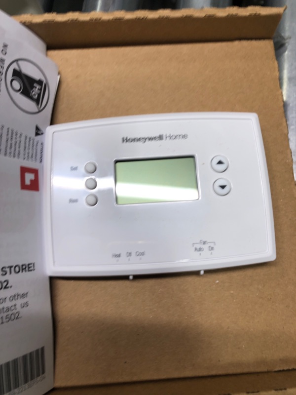 Photo 1 of Honeywell Home RTH221B 1-Week Programmable Thermostat and First Alert Battery Powered Alarm SCO5CN Combination Smoke and CO Detector Thermostat + Smoke and CO Detector