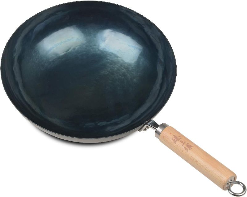 Photo 1 of 
ZhenSanHuan Chinese Hand Hammered Iron Pow Woks and Stir Fry Pans Wooden Handle (Seasoned 34CM)
Size:34CM