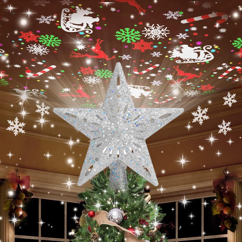 Photo 1 of Kesfitt Christmas Tree Topper Lighted with 6 Projection Modes,Christmas Star Tree Topper Built-in LED Rotating Lights,Sliver 3D Glitter Dynamic Projection for Xmas Party Holiday Decorations
