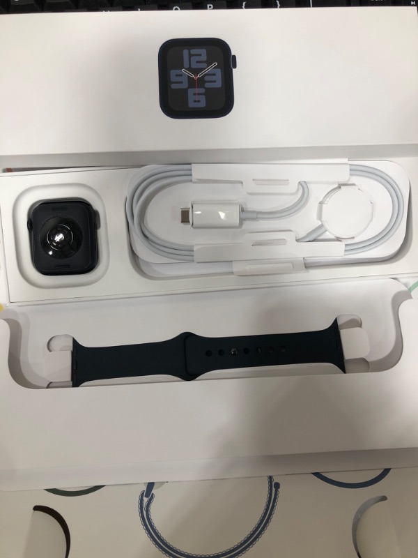 Photo 2 of **BRAND NEW, OPENED TO VERIFY CONTENTS**
Apple Watch SE 2nd Generation (GPS) 40mm Aluminum Case with Midnight Sport Band - S/M  