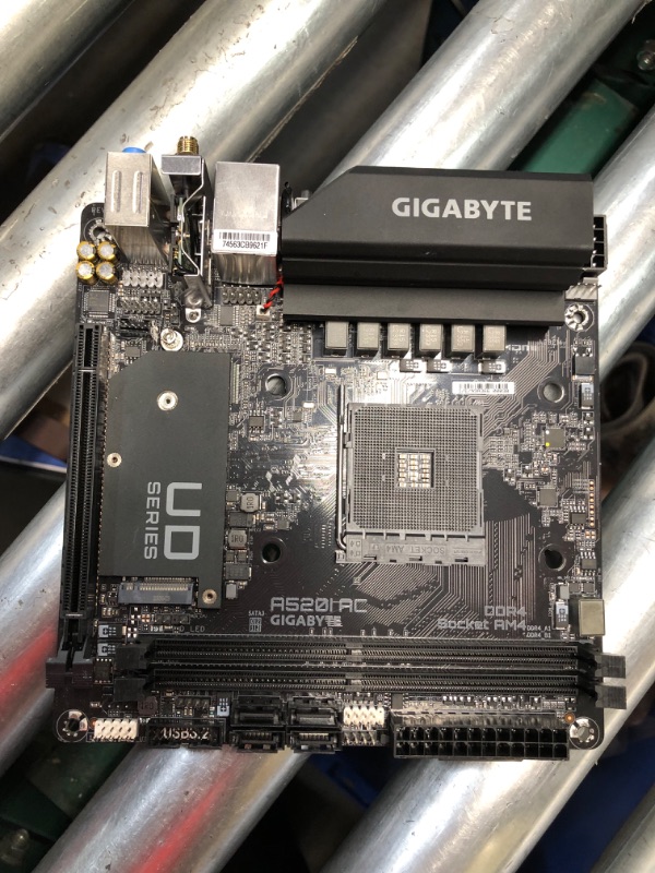 Photo 2 of ***USED - UNABLE TO TEST - SEE PICTURES***
Gigabyte A520I AC (AMD Ryzen AM4/Mini-ITX/Direct 6 Phases Digital PWM with 55A DrMOS/Gaming GbE LAN/Intel WiFi+Bluetooth/NVMe PCIe 3.0 x4 M.2/3 Display Interfaces/Q-Flash Plus/Motherboard)