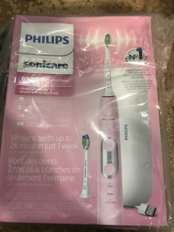 Photo 2 of PHILIPS Sonicare ProtectiveClean 6500 Rechargeable Electric Power Toothbrush with Charging Travel Case and Extra Brush Head, Pink, HX6462/06