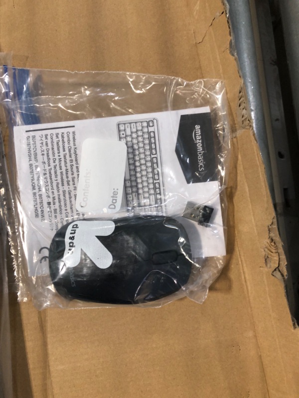Photo 1 of Amazon Basics Wireless Computer Keyboard and Mouse Combo - Quiet and Compact - US Layout (QWERTY)