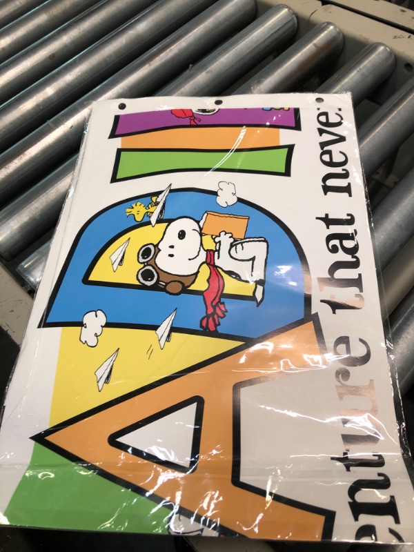 Photo 1 of Eureka Peanuts Snoopy ''Reading is an Adventure'' Classroom Decoration Banner, 45'' x 12'' Snoopy Reading
