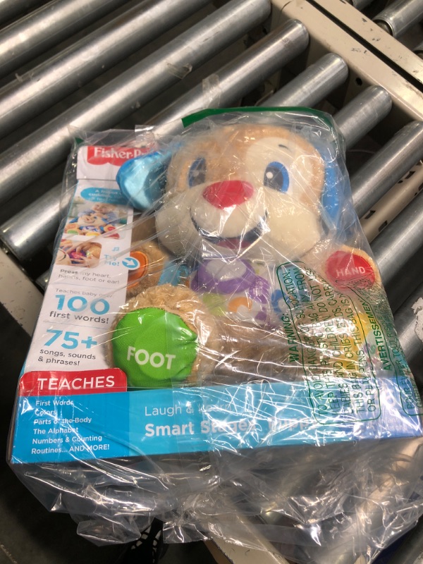 Photo 1 of Fisher-Price Plush Baby Toy with Lights Music and Smart Stages Learning Content, Laugh & Learn Puppy