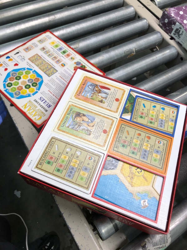 Photo 1 of CATAN Family Edition Board Game | Family Board Game | Board Game for Adults and Family | Adventure Board Game | Ages 10+ | For 3 to 4 players | Average Playtime 60 minutes | Made by Catan Studio

