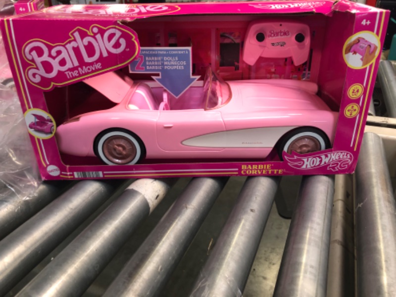 Photo 1 of Hot Wheels RC Barbie Corvette, Battery-Operated Remote-Control Toy Car from Barbie The Movie, Holds 2 Barbie Dolls, Trunk Opens for Storage