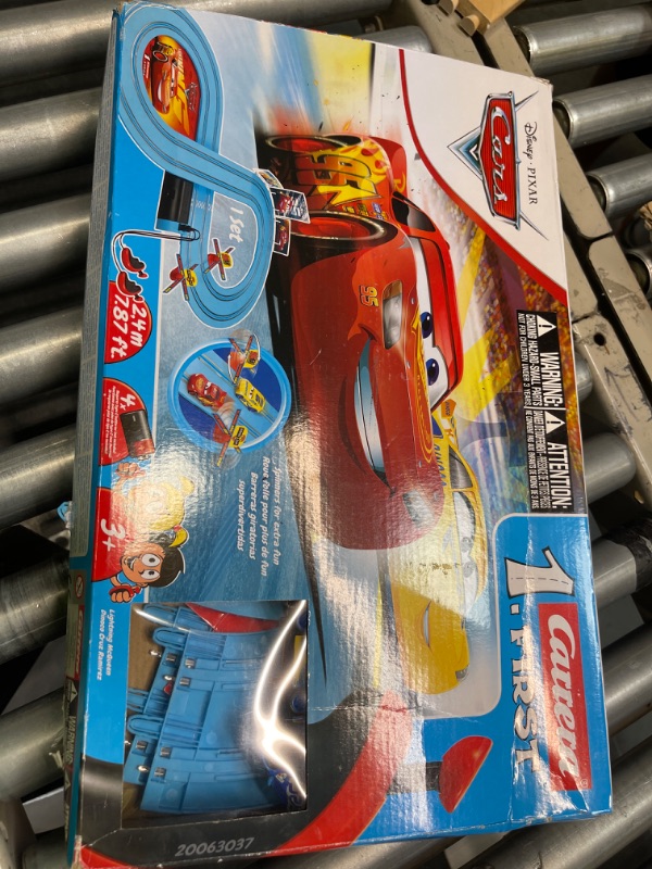 Photo 1 of Carrera First Disney/Pixar Cars - Slot Car Race Track - Includes 2 Cars: Lightning McQueen and Dinoco Cruz - Battery-Powered Beginner Racing Set for Kids Ages 3 Years and Up Disney Cars w/ Spinners