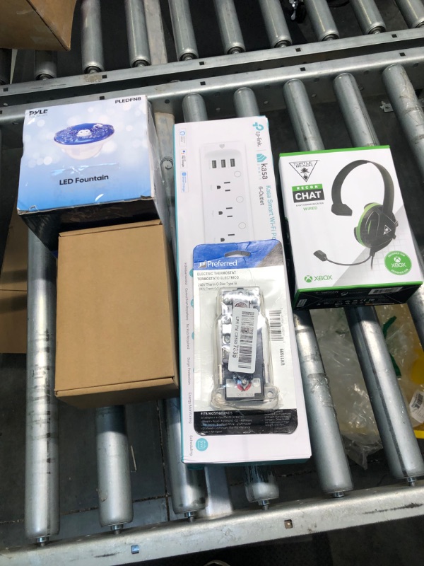 Photo 1 of New and Used Electronic Assorted Combo Pack (Xbox headset / Led Fountain / Surge Protector / Electronic Thermostat / Sprinkler)