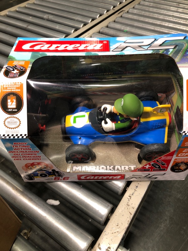 Photo 3 of Carrera RC Official Licensed Mario Kart Mach 8 Luigi 1: 18 Scale 2.4 Ghz Remote Radio Control Car with Rechargeable Lifepo4 Battery - Kids Toys Boys/Girls, (Model: 181067) Mario Kart Mach 8 - Luigi