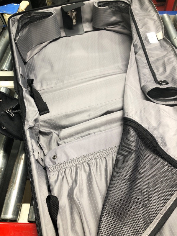 Photo 1 of DELSEY Paris Helium DLX Carryon Garment Bag with Spinner Wheels, Black, Carry on 20 Inch