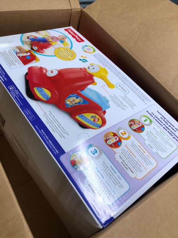 Photo 2 of Fisher-Price Laugh & Learn Toddler Ride-On, Smart Stages Scooter, Musical Learning Toy with Motion-Activated Songs for Ages 1+ Years