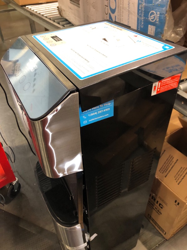 Photo 1 of Brio Moderna Bottom Load Water Cooler Dispenser - Tri-Temp, Adjustable Temperature, Self-Cleaning, Touch Dispense, Child Safety Lock, Holds 3 or 5 Gallon Bottles, Digital Display and LED Light Stainless Steel Moderna