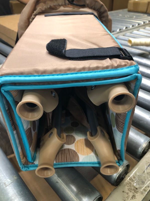Photo 1 of Dream On Me Zodiak Portable Playard in Coffee and Blue, Lightweight, Packable and Easy Setup Baby Playard, Breathable Mesh Sides and Soft Fabric - Comes with a Removable Padded Mat Coffee/Blue
Bottom Torn 