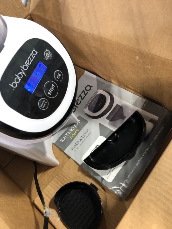 Photo 1 of Baby Brezza Formula Pro Mini Baby Formula Maker – Small Baby Formula Mixer Machine Fits Small Spaces and is Portable for Travel– Bottle Makers Makes The Perfect Bottle for Your Infant On The Go Formula Pro Mini Dispenser Machine