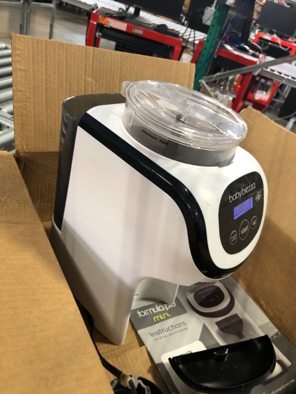 Photo 4 of Baby Brezza Formula Pro Mini Baby Formula Maker – Small Baby Formula Mixer Machine Fits Small Spaces and is Portable for Travel– Bottle Makers Makes The Perfect Bottle for Your Infant On The Go Formula Pro Mini Dispenser Machine