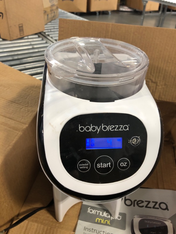 Photo 2 of Baby Brezza Formula Pro Mini Baby Formula Maker – Small Baby Formula Mixer Machine Fits Small Spaces and is Portable for Travel– Bottle Makers Makes The Perfect Bottle for Your Infant On The Go Formula Pro Mini Dispenser Machine