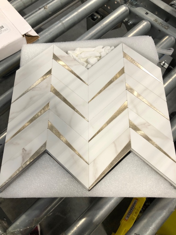 Photo 3 of STICKGOO 10-Sheet Herringbone Tile Peel and Stick Backsplash, White Marble PVC Mixed Metal Gold Stick on Backsplash, Self Adhesive Wall Tile for Kitchen and Bathroom 10 White Marble Mixed Gold