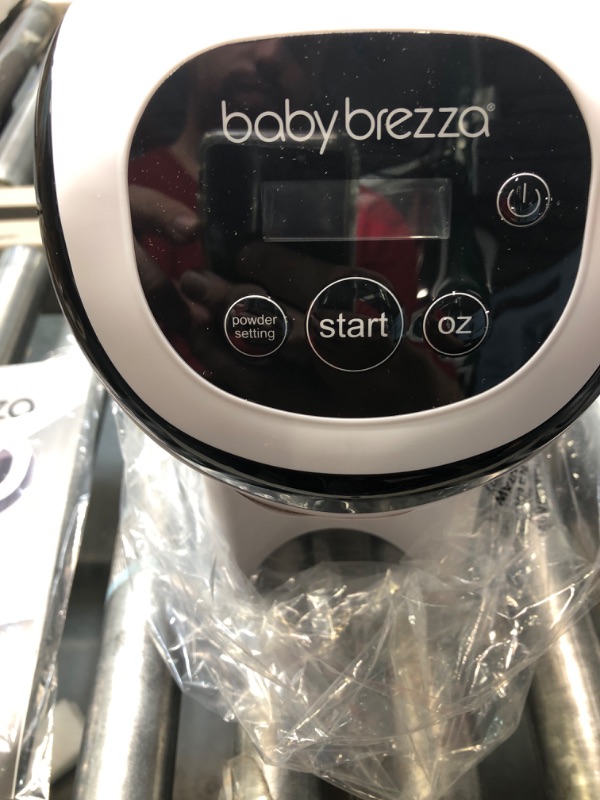 Photo 4 of Baby Brezza Formula Pro Mini Baby Formula Maker – Small Baby Formula Mixer Machine Fits Small Spaces and is Portable for Travel– Bottle Makers Makes The Perfect Bottle for Your Infant On The Go
