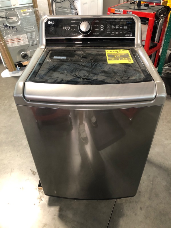 Photo 2 of Lg 5.5 Cu. Ft. SMART Top Load Washer in Graphite Steel with Impeller, NeveRust Drum and TurboWash3D Technology
