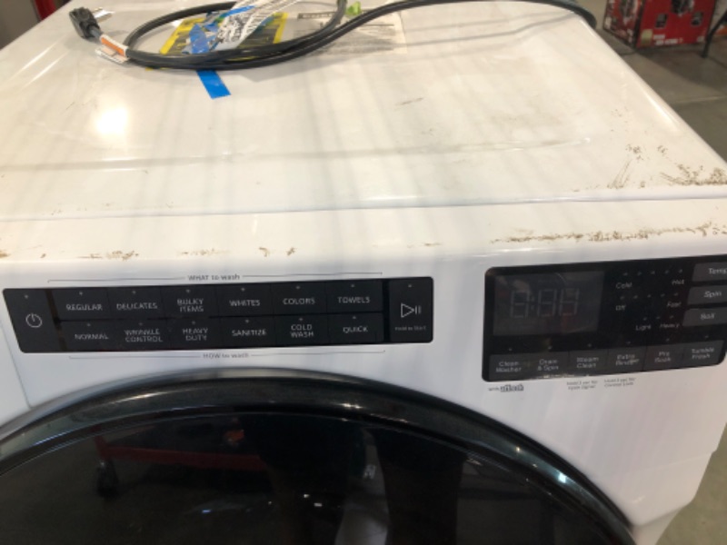 Photo 3 of Whrilpool 4.5 cu. ft. Front Load Washer with Steam, Quick Wash Cycle and Vibration Control Technology in White, ADA Compliant