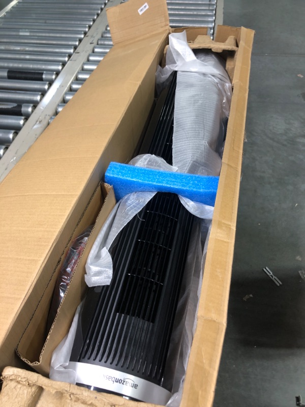 Photo 1 of Amazon Basics Oscillating 3 Speed Tower Fan with Remote