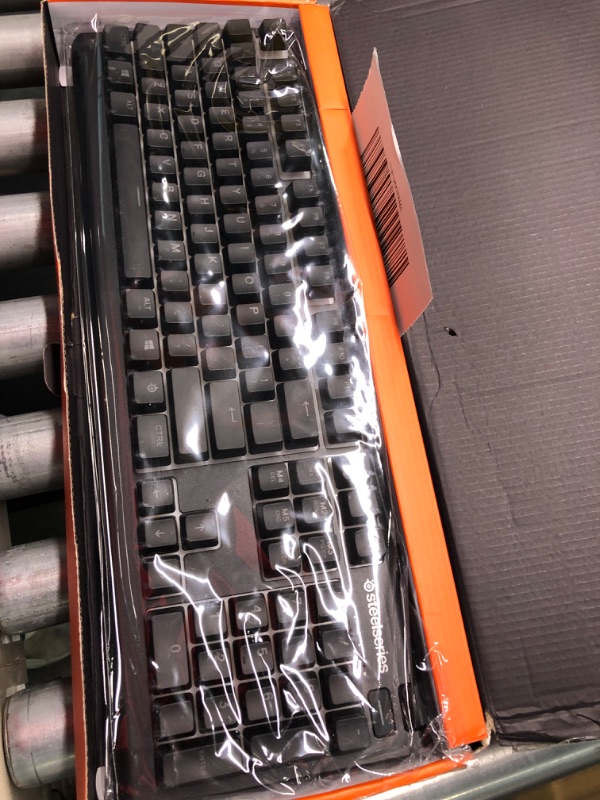 Photo 1 of SteelSeries Apex 3 RGB Gaming Keyboard – 10-Zone RGB Illumination – IP32 Water Resistant – Premium Magnetic Wrist Rest (Whisper Quiet Gaming Switch)