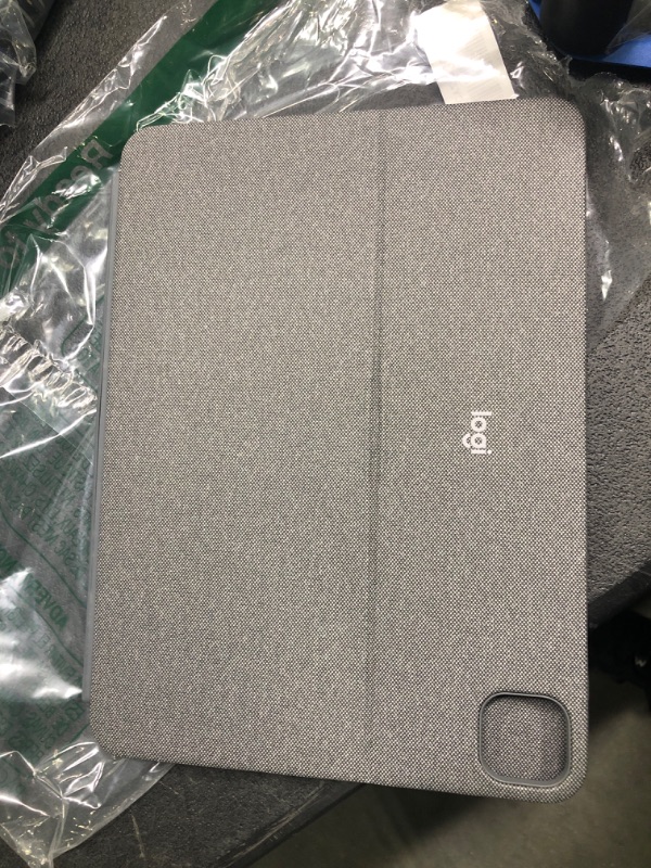Photo 1 of Logitech Folio Touch iPad Keyboard Case with Trackpad and Smart Connector for iPad Air (4th and 5th Generation) – Graphite Folio Touch Tablet Keyboard Graphite
case with keyboard only