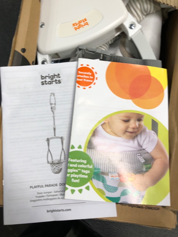 Photo 1 of Bright Starts Playful Parade Door Jumper for Baby with Adjustable Strap, 6 Months and Up, Max Weight 26 lbs