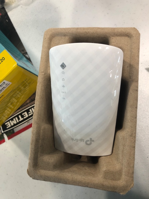 Photo 3 of TP-Link AC750 WiFi Extender (RE220), Covers Up to 1200 Sq.ft and 20 Devices, Up to 750Mbps Dual Band WiFi Range Extender, WiFi Booster to Extend Range of WiFi Internet Connection