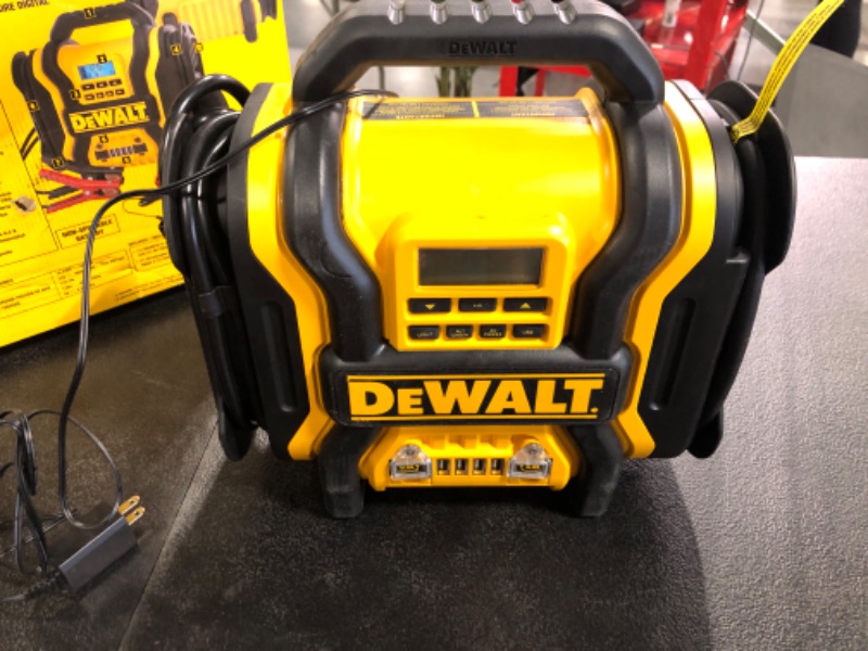 Photo 3 of DEWALT DXAEPS14 1600 Peak Battery Amp 12V Automotive Jump Starter/Power Station with 500 Watt AC Power Inverter, 120 PSI Digital Compressor, and USB Power , Yellow