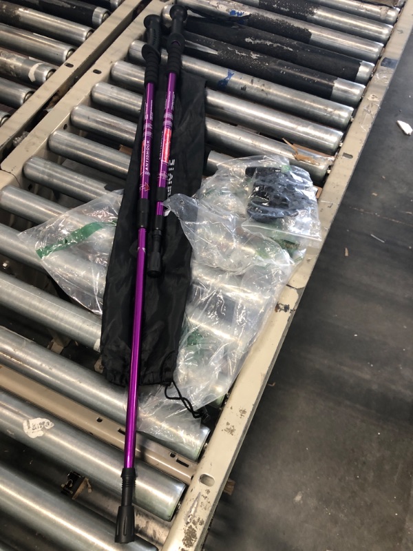 Photo 1 of Aihoye Hiking Trekking Poles, 2 Pack Collapsible,Lightweight, Anti Shock, Hiking or Walking Sticks,Adjustable Hiking Pole for Men and Women purple