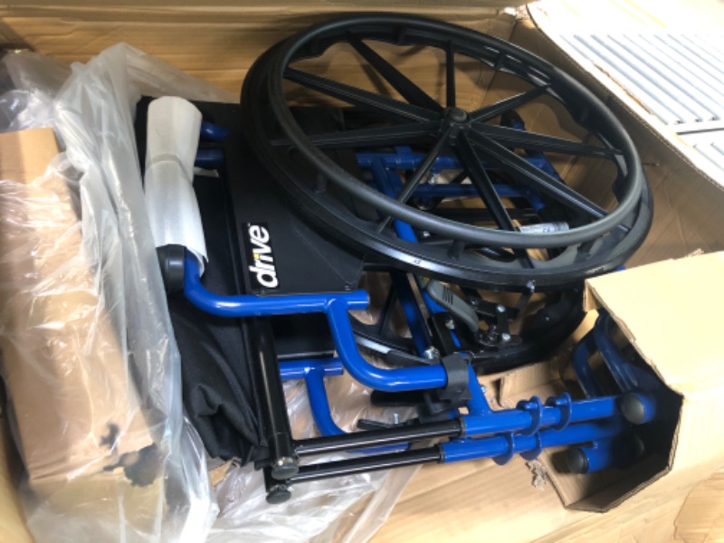 Photo 1 of Drive Medical Blue Streak Wheelchair with Flip Back Desk Arms, Swing Away Footrests, 16 Inch Seat 16 Inch Swing Away Footrests
